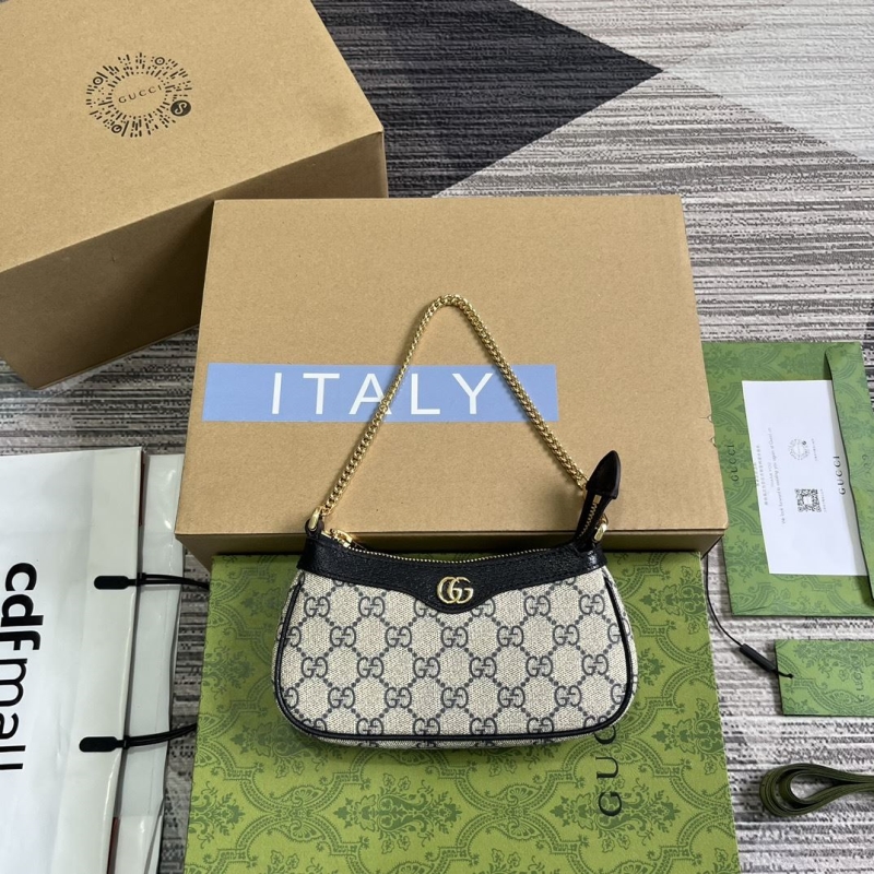 G*u*i top handle bags